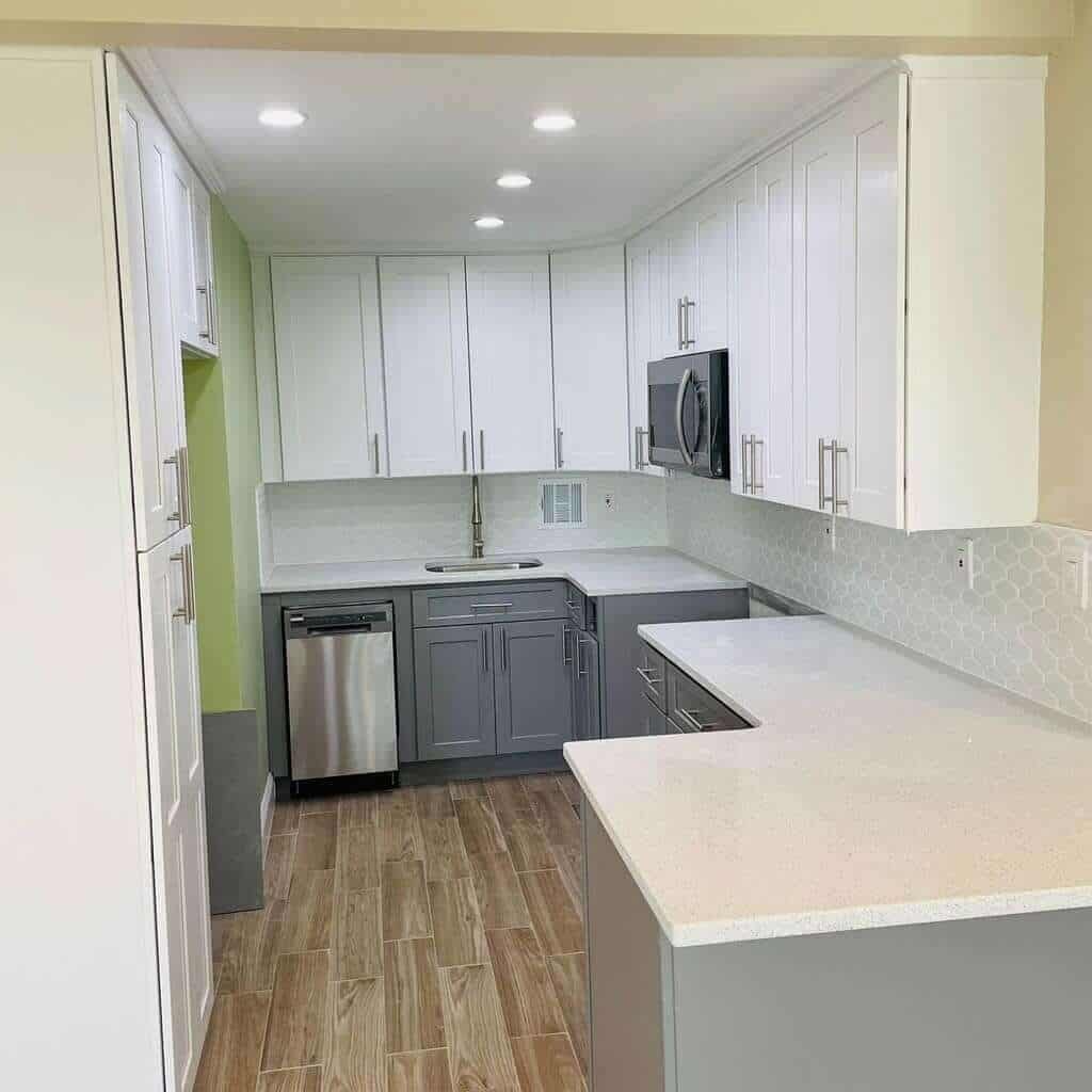 Contemporary Two-Tone Kitchen Renovation with Custom Cabinetry