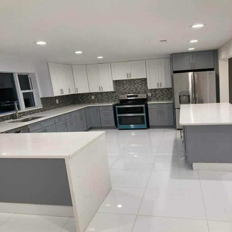 Spacious Gray & White Kitchen Renovation with Dual Islands