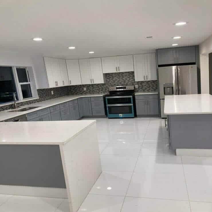 Spacious Gray & White Kitchen Renovation with Dual Islands