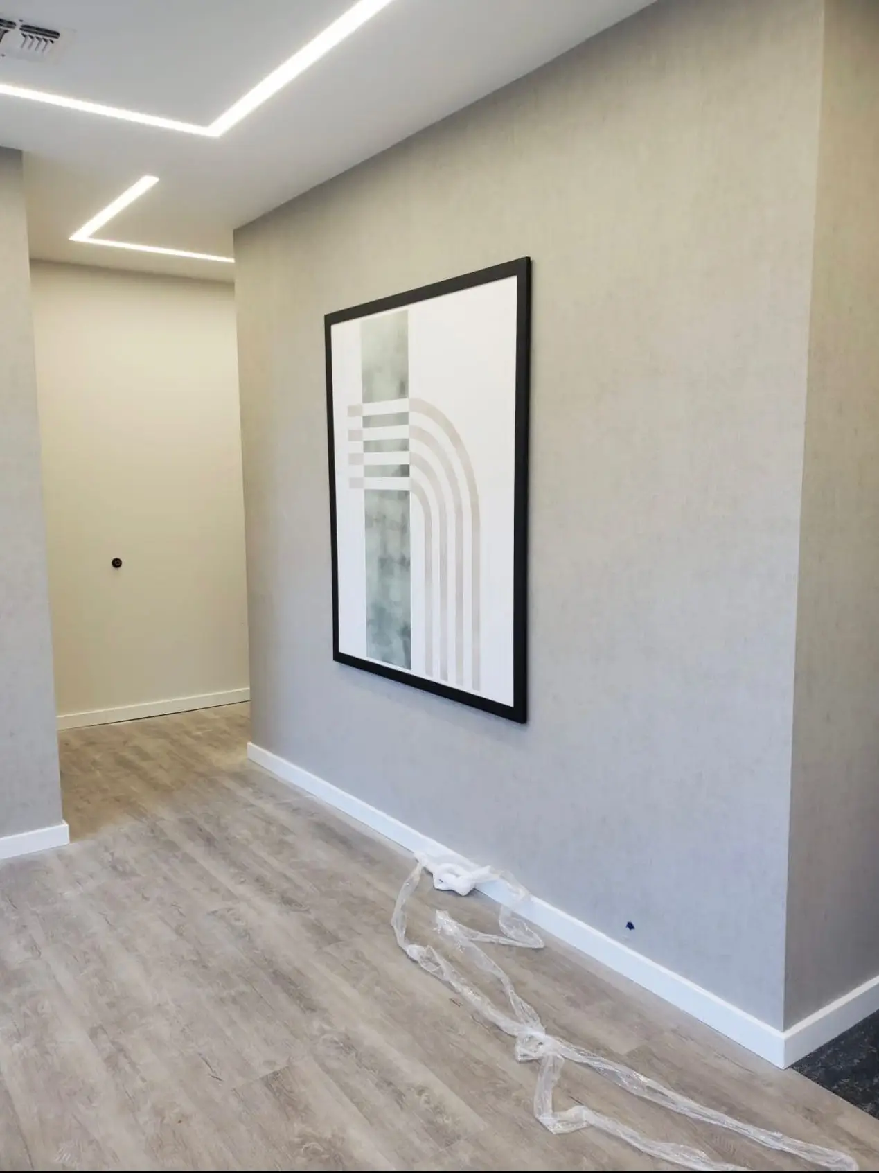 Modern Wood-Look Flooring Installation for a Refined Interior
