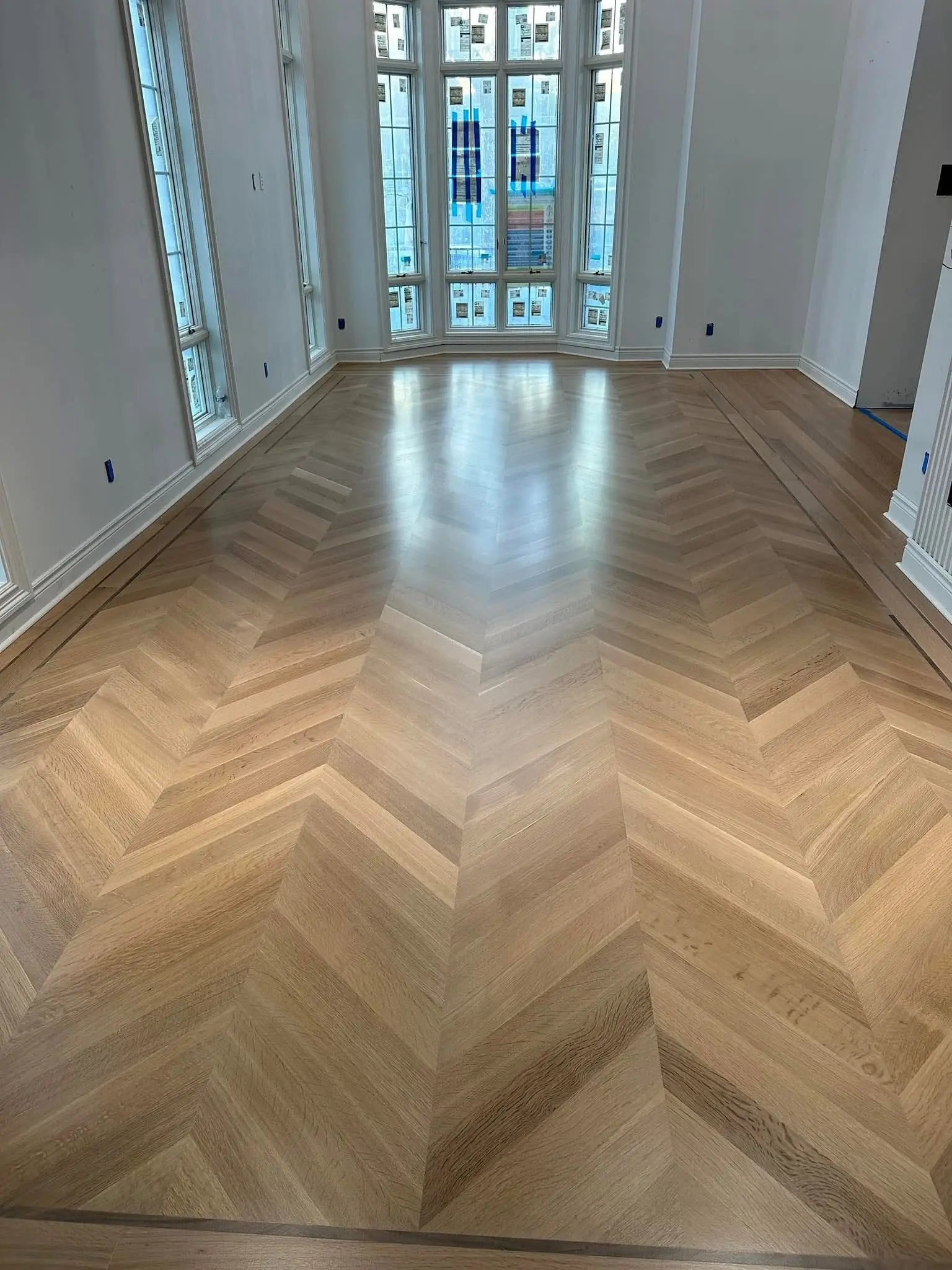 Custom Chevron Hardwood Flooring Installation